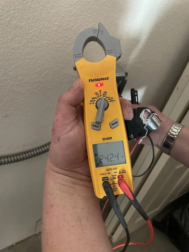 Voltage testing with clamp meter during Generator Installation in Holliston